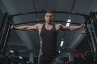 Lat pull down is also a great pull day workouts (Image via Pexels @Tima Miroshnichenko)